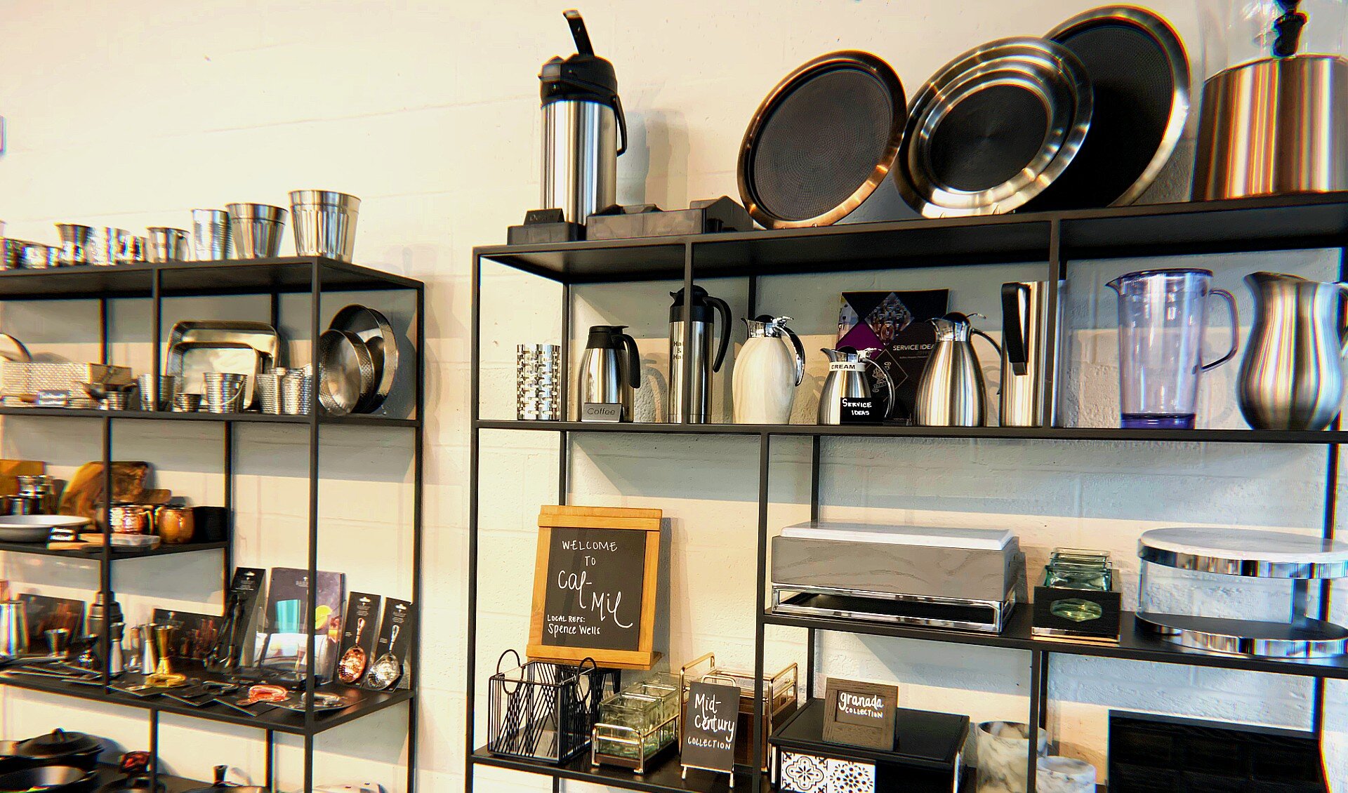 Bar and tabletop accessories display just inside the showroom door